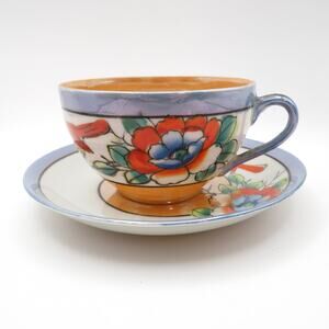 Antique Nippon Japan Cup and Saucer Hand Painted Floral Bird w/ Orange Interior